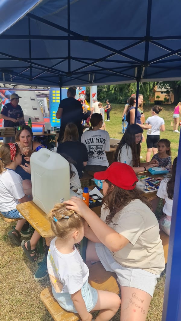 Family outdoor event with children's activities documented in Bratislava