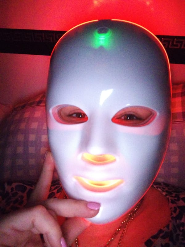 Family dinner gathering with LED therapy, food, wine documented