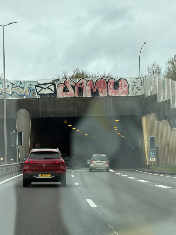 Red Mercedes enters highway tunnel in Luxembourg City