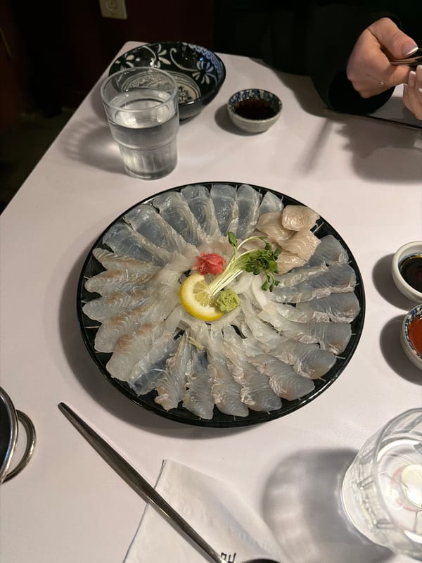 Woman enjoys sashimi lunch at Seoul restaurant