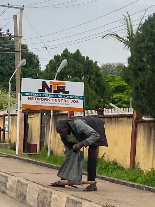 Street life and quiet interiors across a Jos afternoon