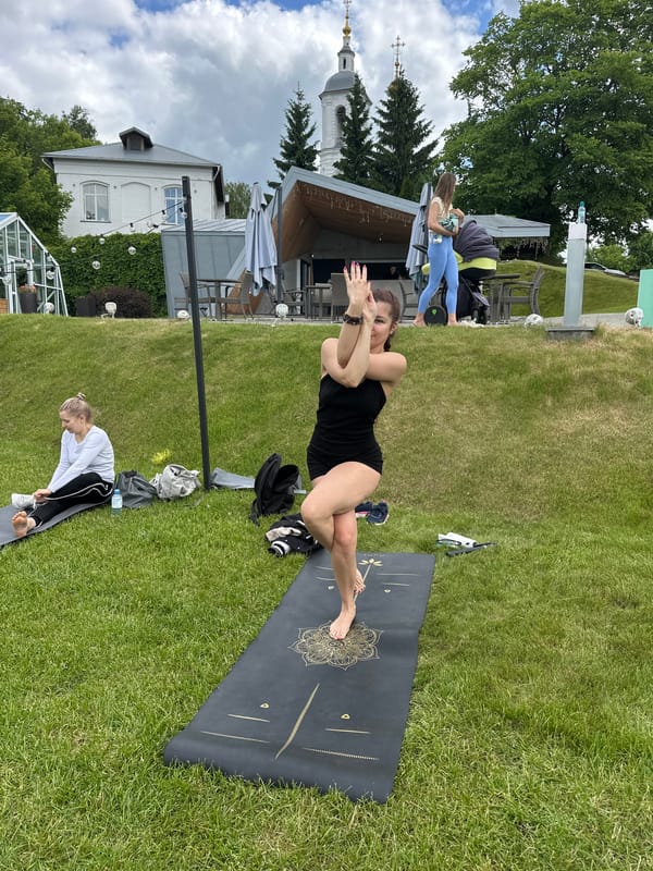 Morning yoga session documented in Vladimir, Russia park