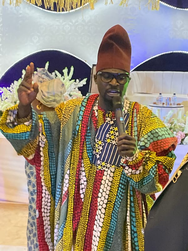 Man delivers speech at decorated venue in Jos, Nigeria