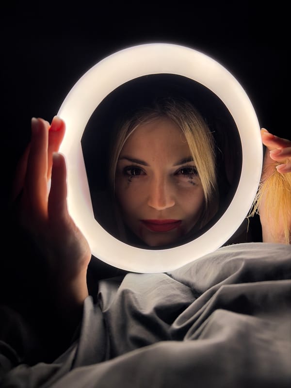 Woman uses ring light for content creation in Budva