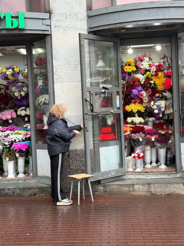 Woman observed at Saint Petersburg flower shop early morning