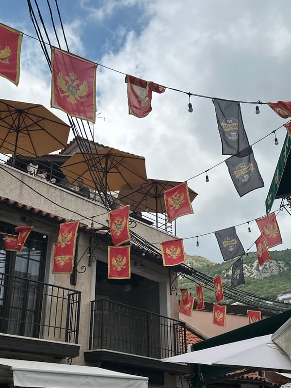 Tourist documents historic Stari Bar architecture and cafes