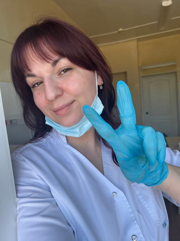 Healthcare worker documents workday in Russian medical facility