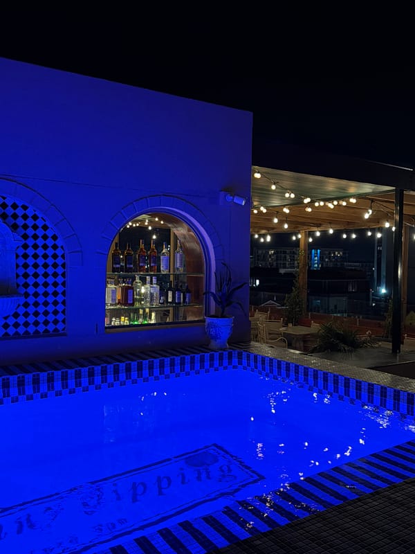 Evening documented at Cape Town rooftop bar with pool