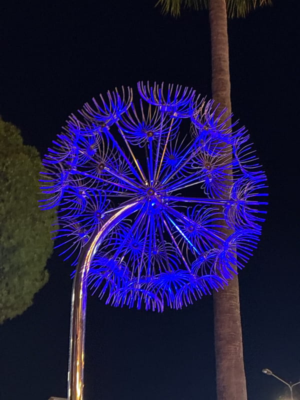 Alanya's waterfront promenade glows with summer night lighting