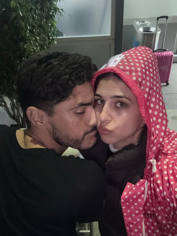 Couple poses for photo in New Delhi evening