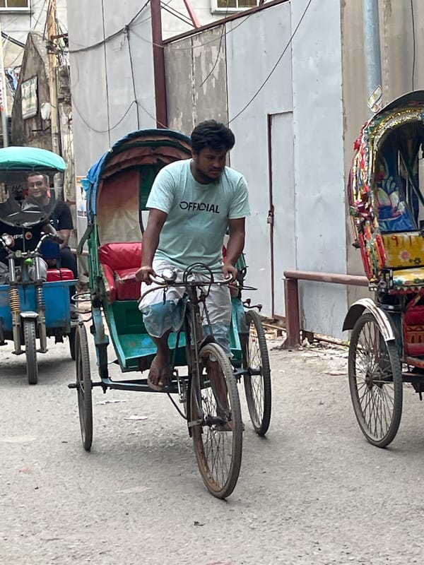 Daily life unfolds along Dhaka's rivers and streets