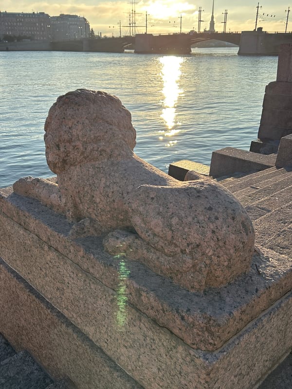 Early morning along a historic European river embankment