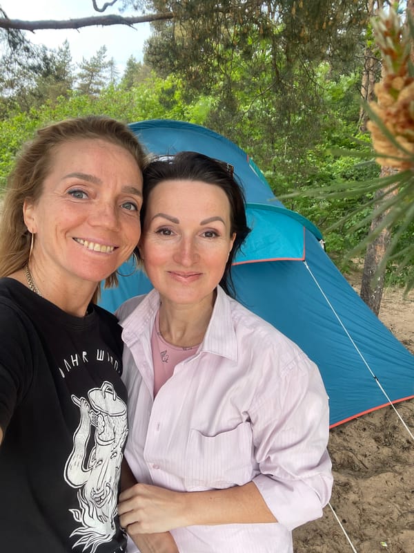 Camping group enjoys forest picnic and beach walks in Russia