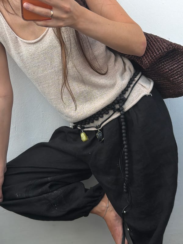 Woman takes selfies with orange phone in Khimki