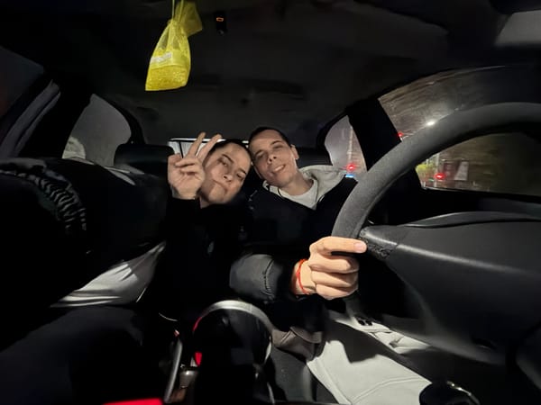 Two men in car during rainy evening in Plovdiv