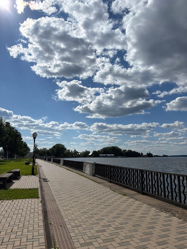 Woman documents sunny waterfront visit in Votkinsk, Russia