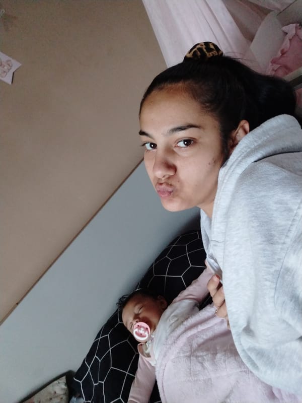 Early morning domestic moments: woman, baby, and Mercedes-Benz documented