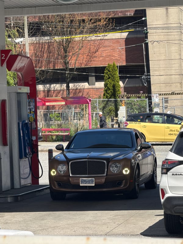 Evening traffic observed at Vancouver intersection and gas station