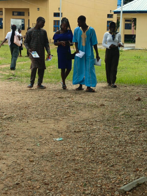 Midday activity outside a school compound in Akwanga, Nigeria