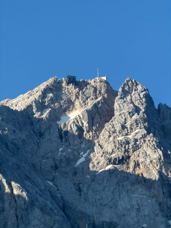 Zugspitze and its cable car infrastructure on a clear morning