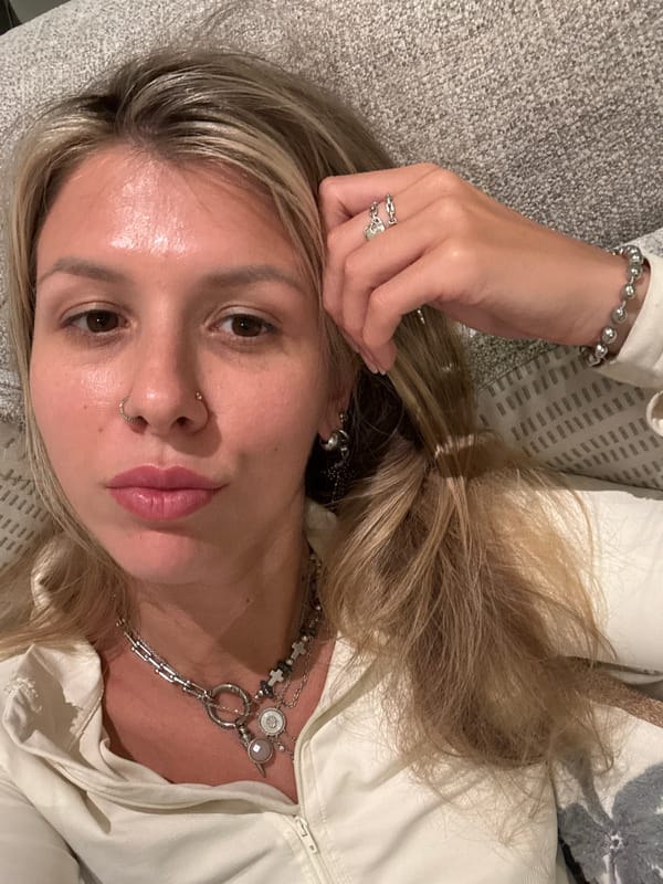 Relaxed indoor selfie series, white hoodie, couch setting