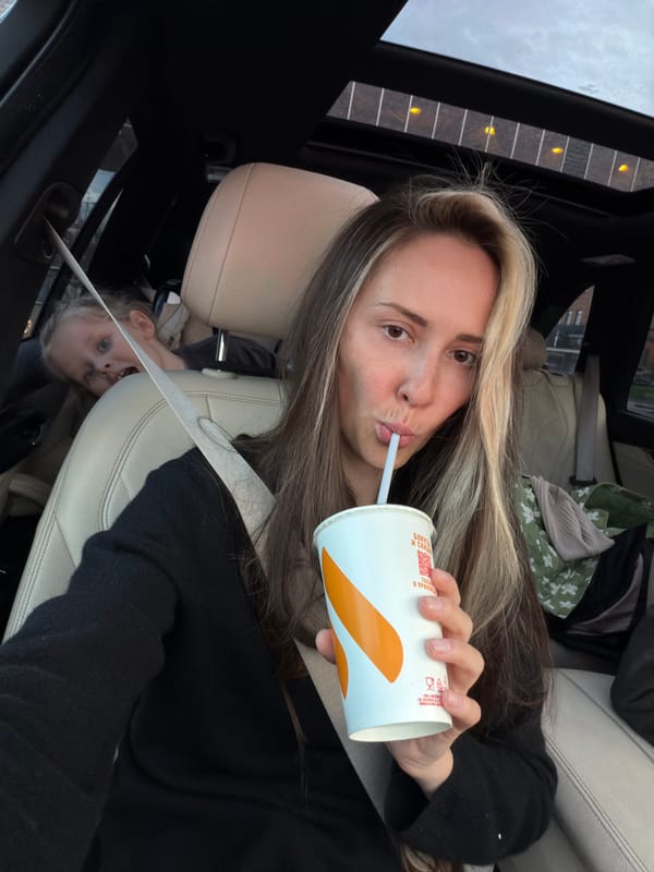 Woman and child observed in casual car moment, Moscow