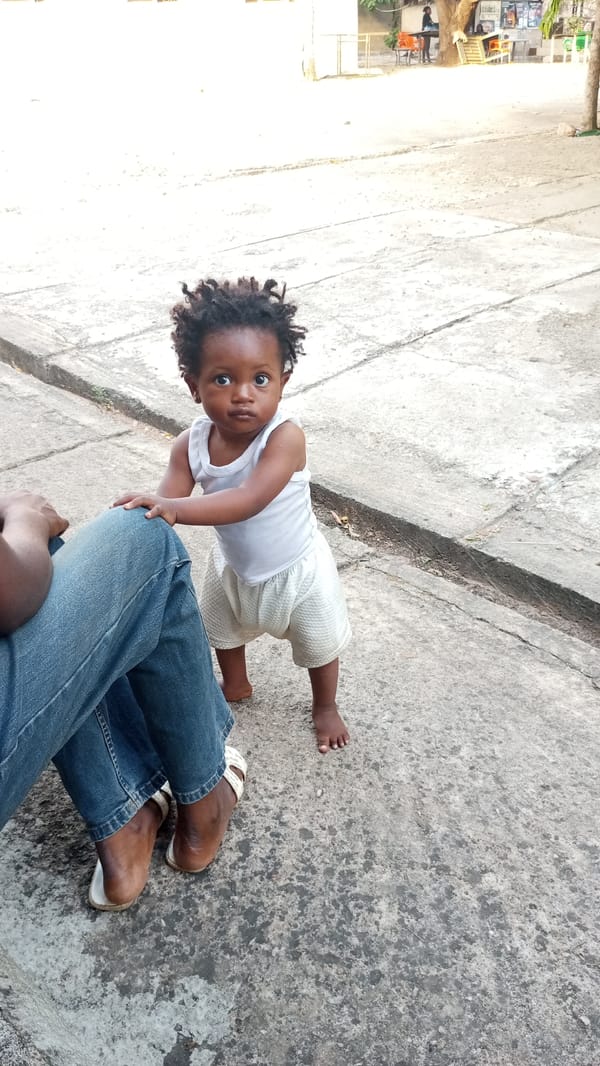 Ordinary afternoon moments documented across Adankolo, Nigeria neighborhood