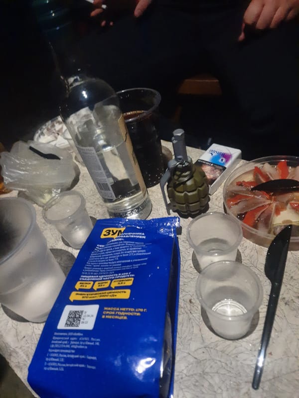 Post-gathering scene documented with mixed civilian and military items