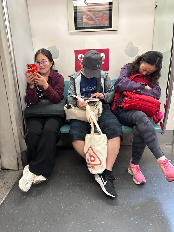 Morning commuters ride Beijing subway toward Gaomidian North station