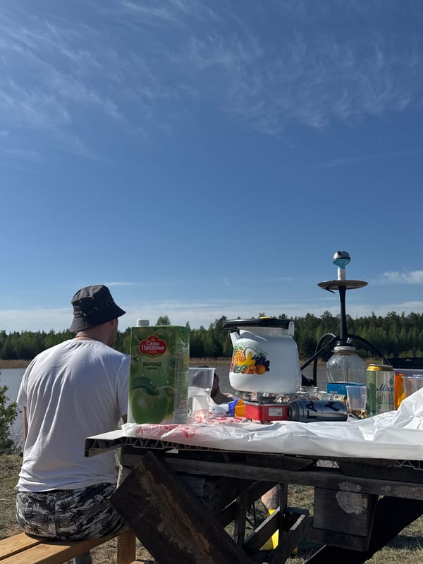 Person spotted outdoors in bucket hat near Noviy, Russia