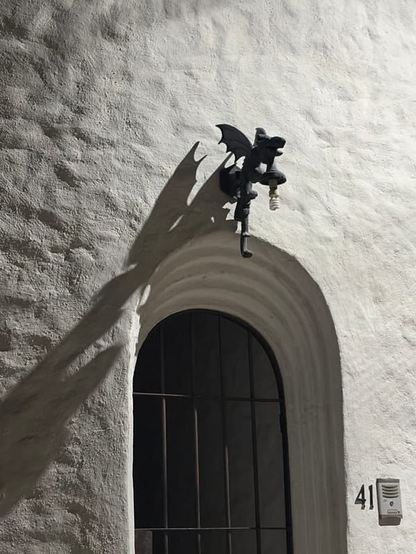 Bat-shaped lamp fixture spotted on wall in Cuernavaca