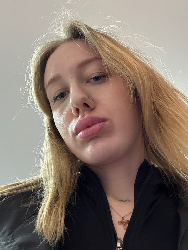 Woman Takes Selfies With Pet Corgi in Ovoshchnoy