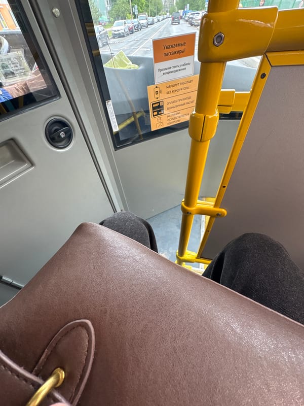 Passenger validates transit card on Saint Petersburg bus