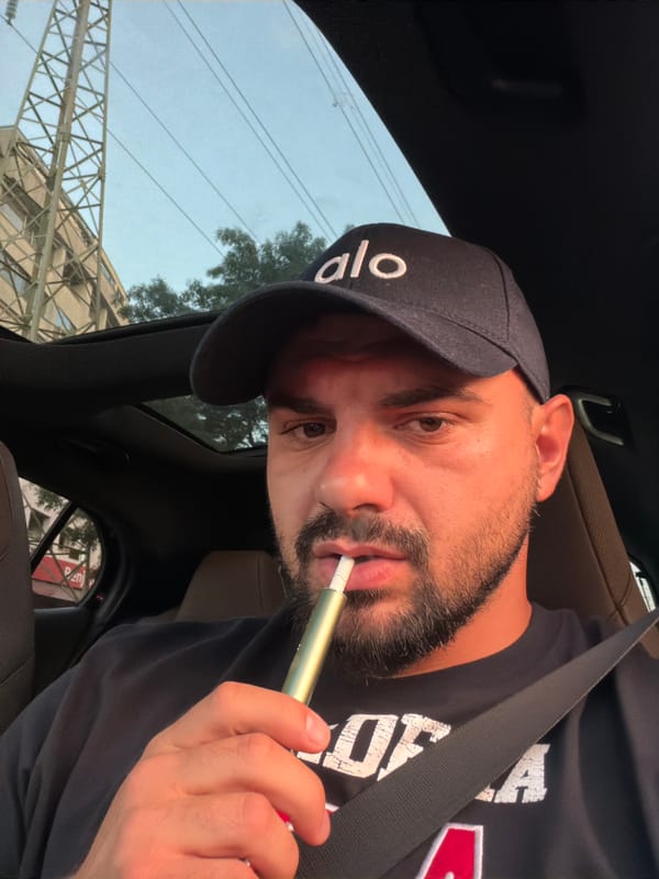 Car selfie in Sofia, dark cap with 'alo' branding
