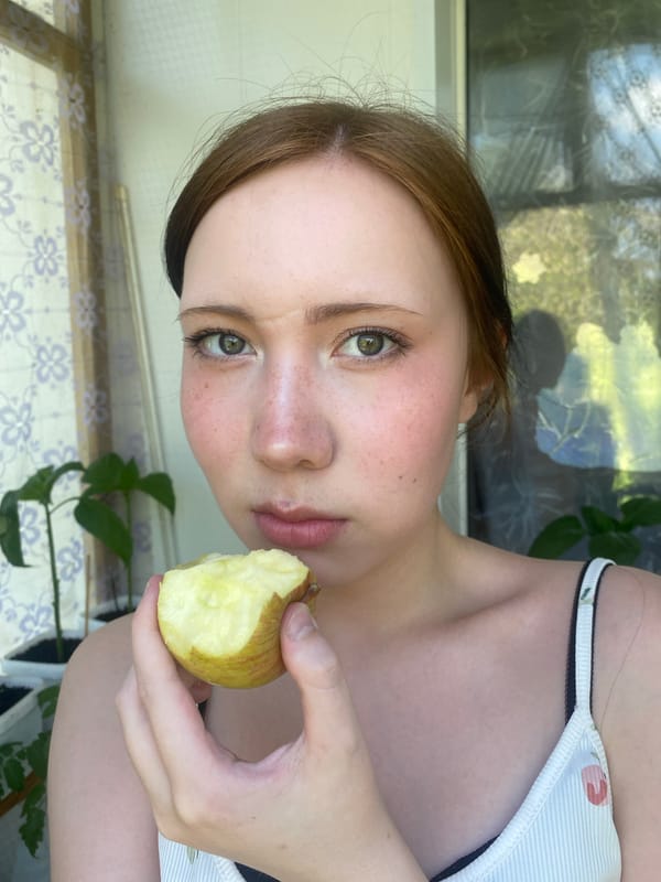 Woman with apple photographed in brief morning sighting