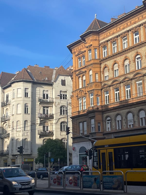 Clear spring afternoon documented across Budapest streets