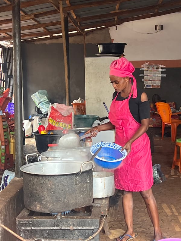 Morning food preparation at outdoor kitchen in Nkpor, Nigeria