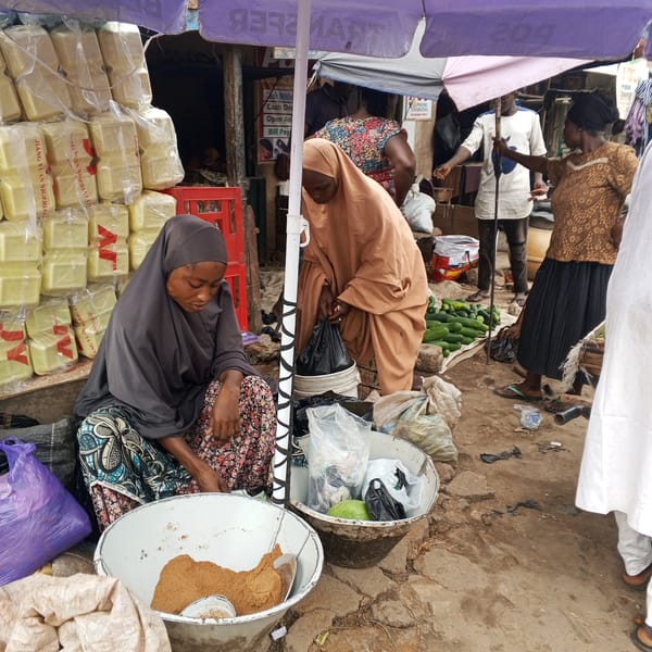 Nigerian markets bustling with vendors, produce, promotional activities