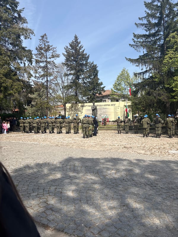 Military band performs at outdoor ceremony in Strelcha, Bulgaria