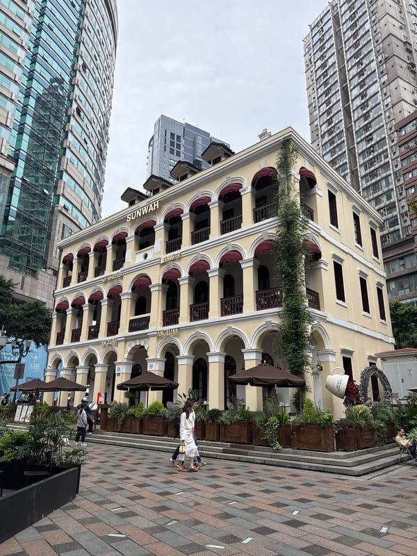 Breakfast documented at Chongqing café with carnation table decoration