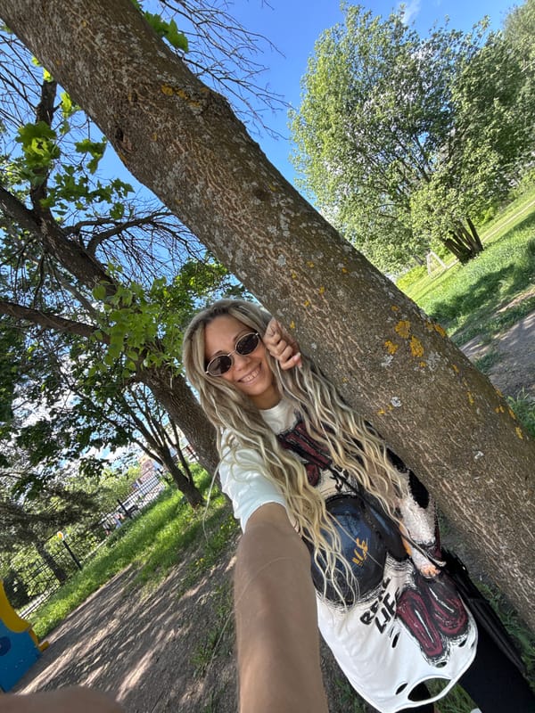 Woman photographed in casual moments in Rusanovo park and indoors