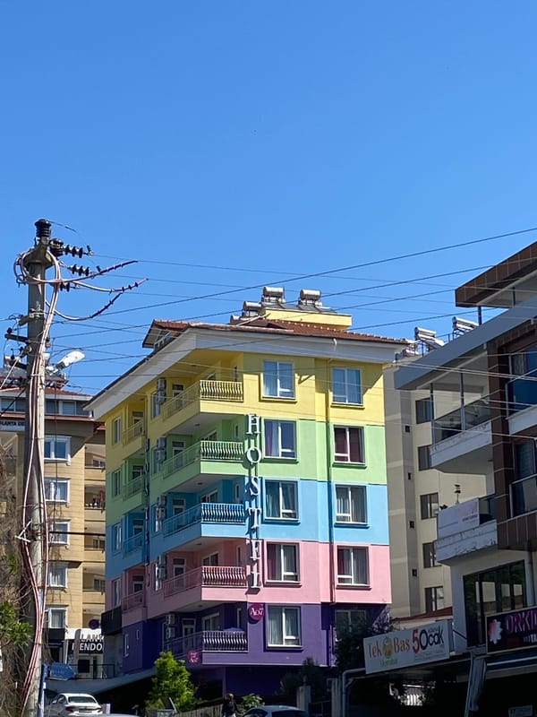 Clear skies and minarets captured in Alanya street scene