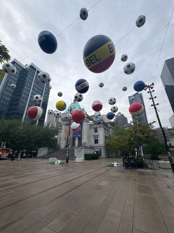 Downtown Vancouver plaza features giant suspended soccer ball decorations