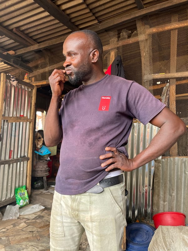 Street vendors and artisans work in Jos commercial districts