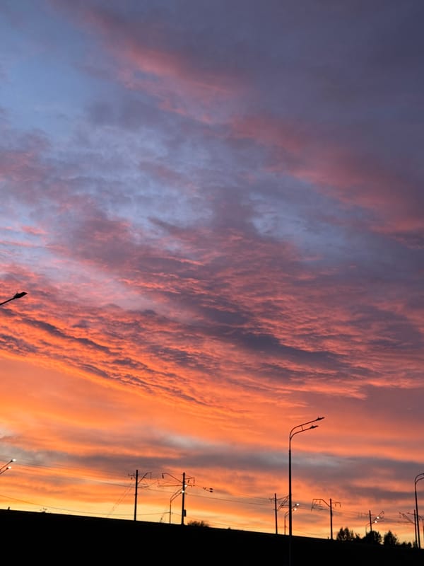 Vivid summer sunset blazes over Nizhny Novgorod skyline