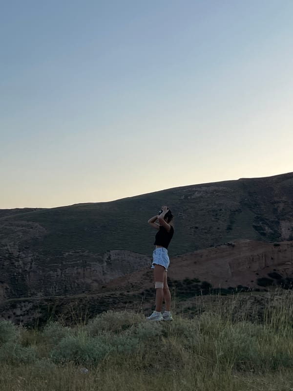 Exploring the arid hills outside Mailuu-Suu City, Kyrgyzstan