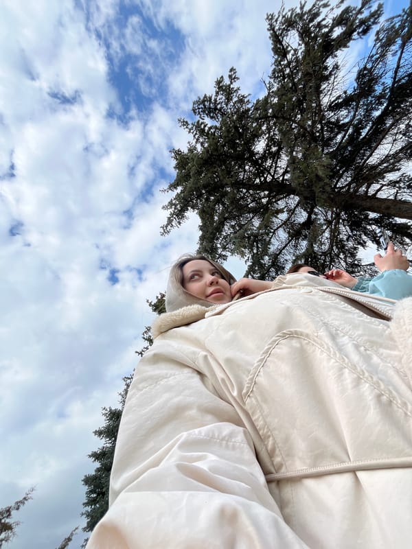 Friends take selfies outdoors in Russian village