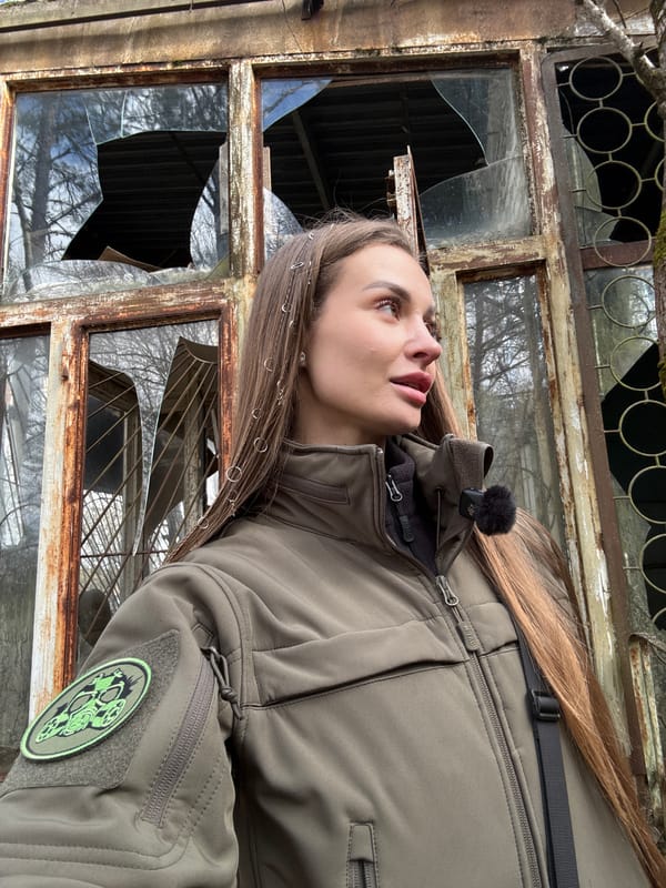 Woman in tactical gear spotted near broken window in Prypiat
