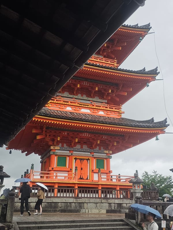 Morning view captures Kiyomizu-dera pagoda under gray Kyoto skies