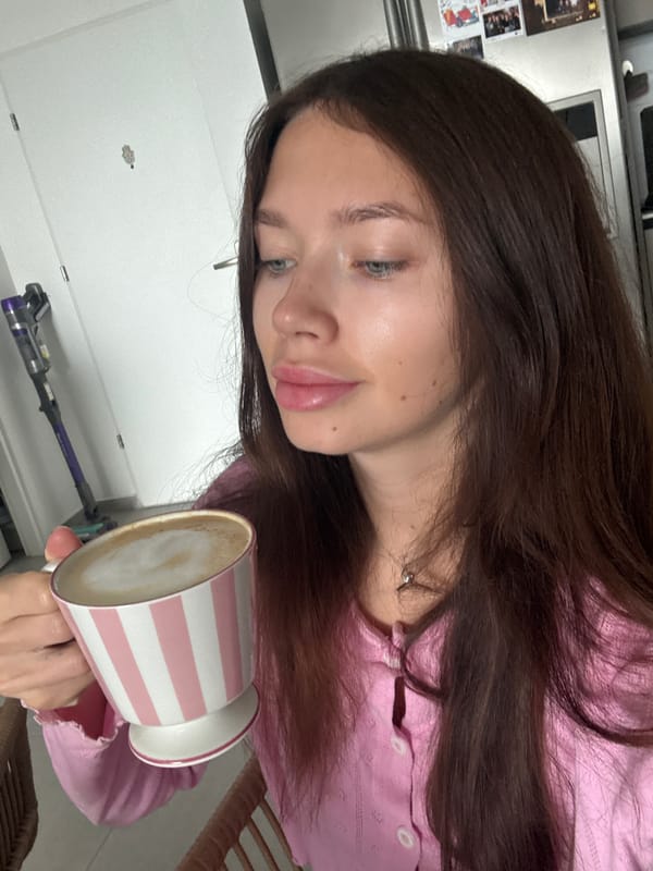 Woman enjoys breakfast with coffee and eggs in Ramat Gan